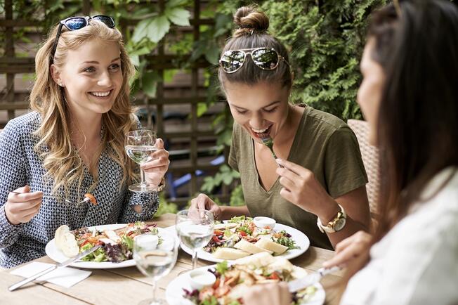 Girls eating in a terrace